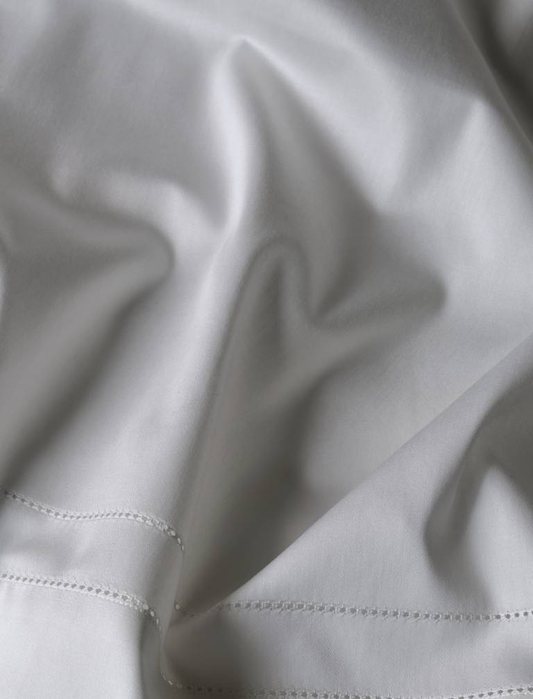 Frette Signature Sateen bedding crafted in Italy from extra-long staple cotton with soft sheen